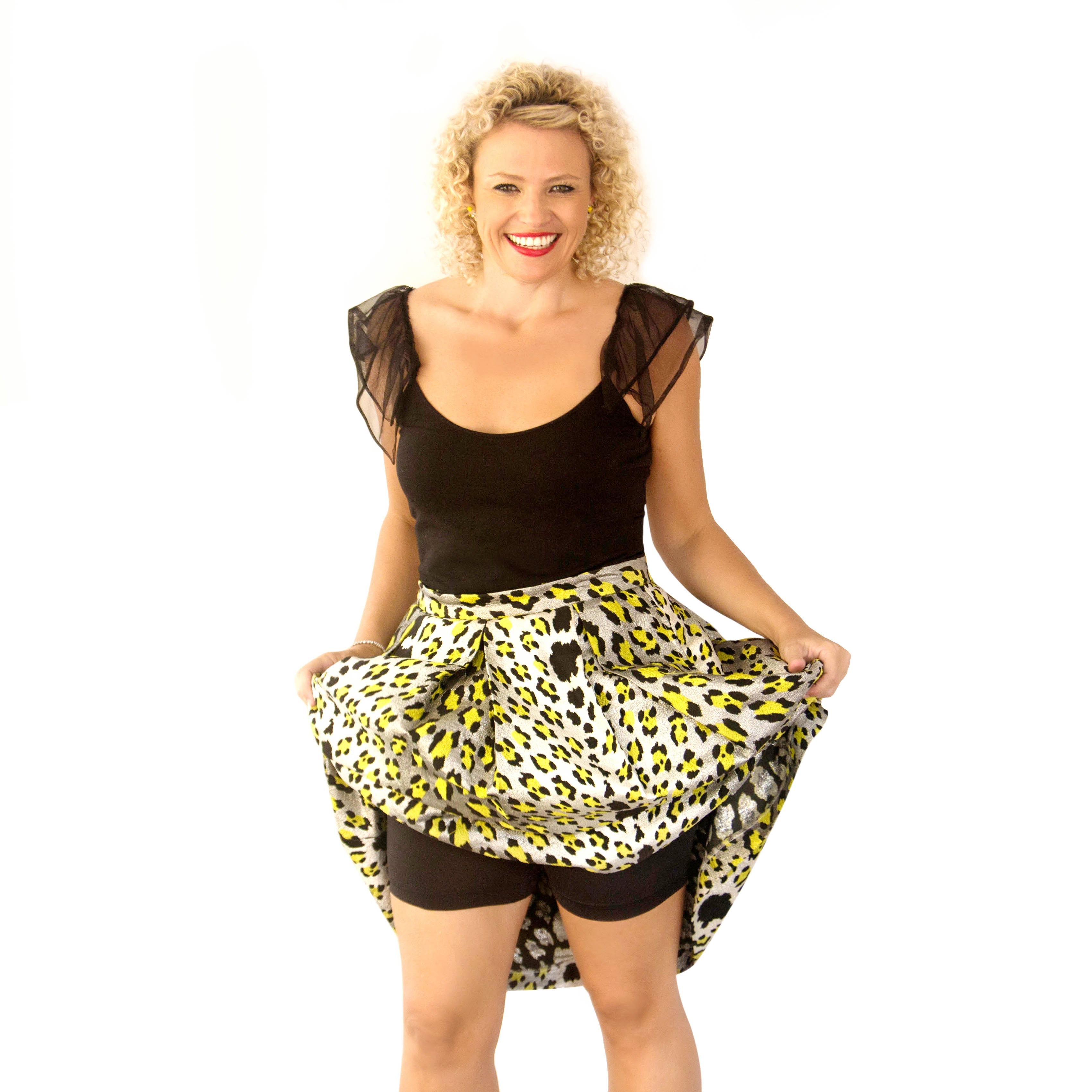 Susie wearing Midnight Wish Skanties showing them off in a glamorous evening outfit with a black singlet with tulle sleeves and a rockstar leopard and silver skirt. She looks funs and glamorous and like she is ready for some fun!