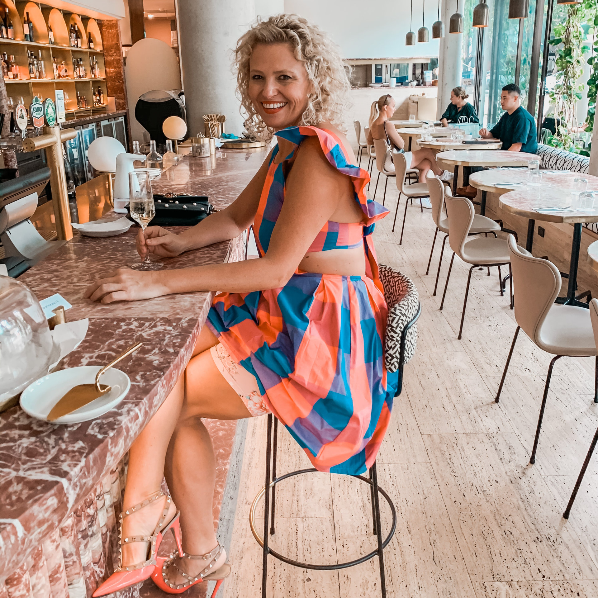 Susie Taaffe, founder of Skanties, celebrating in a bright, joyful moment.